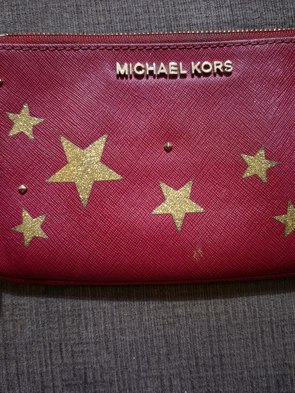 Michael Kors Cherry Red Leather Wristlet with Gold Star Accents